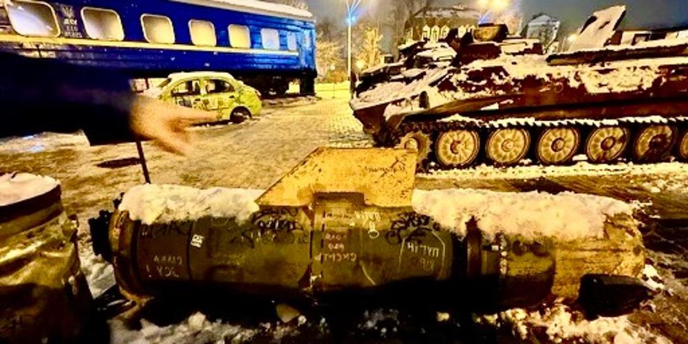 Displayed in Kyiv: captured Russian war materiel, some with anti-Putin graffiti, and a bullet-ridden civilian train car and automobile used by Ukrainians fleeing the fighting. 
